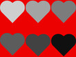 graue Herzen auf roten Hintergrund