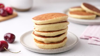 Wall Mural - Buttermilk pancakes with sweet cherry for breakfast