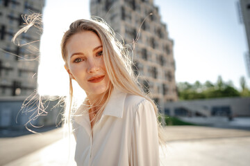 Canvas Print - Close up portrait of young businesswoman outdoors