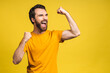 © denis_vermenko - Happy winner! Portrait of shocked amazed young male man keeps mouth widely opened, being surprised, expresses great surprisment. Isolated over yellow background.