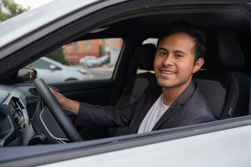 man driving a car