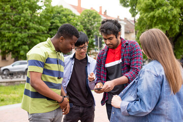 Happy diversity friends meeting outdoor in park