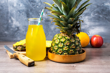 Wall Mural - fresh pineapple juice in glass jar with pineapple