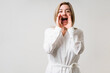 © AntonioDiaz - Passionate mature woman yelling good news