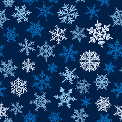 Christmas seamless pattern with complex big and small snowflakes, colored on blue background