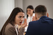© New Africa - Coworkers bullying their colleague at workplace in office,