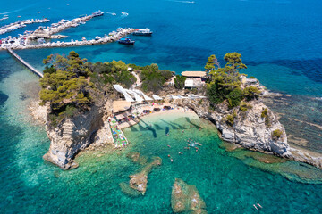 Wall Mural - aerial view of popular islet of cameo in agios sostis, laganas, zakynthos island, greece, with peopl