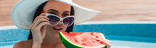 Young Woman Holding Sunglasses And Watermelon Near Blurred Pool, Banner