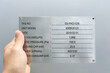 A stainless steel nameplate of a mechanical equipment.