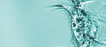 Trendy Summer Nature Banner. 
Defocused Aqua-mint Liquid Colored Clear Water Surface Texture With Splashes Bubbles With Copy Space. Water Waves In Sunlight Background. 