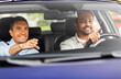 © Syda Productions - driver courses and people concept - happy smiling car driving school instructor teaching young man to drive