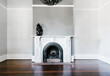 © Austockphoto - traditional open fireplace with marble surround
