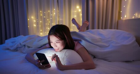 Sticker - woman use smartphone on bed