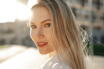 Wall Mural - Close up portrait of young businesswoman outdoors