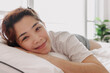 © Sevendeman - Close up of happy Asian woman just wake up in warm morning of summer.