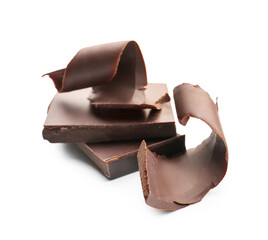 Wall Mural - Delicious chocolate curls and pieces on white background