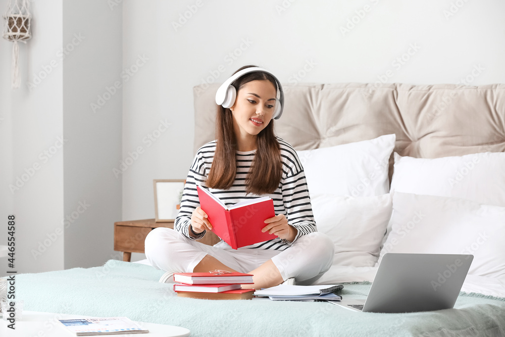 Female student preparing for exam at home