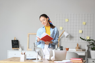 Poster - Female student preparing for exam at home