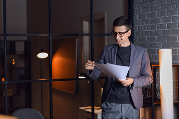 Sticker - Businessman working in office late at night