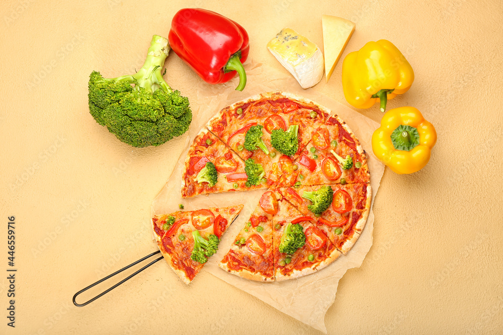 Parchment with tasty vegetarian pizza on color background