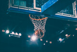Fototapeta Sport - Scoring during a basketball game ball in hoop