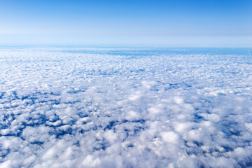 Wall Mural - View of a cloud with a blue sky from the window. With space to copy text
