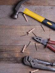 Wall Mural - Set of hand tools for repair top view on a wooden background. Repair of items