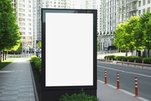 Blank Advertising Board On City Street. Mockup For Design
