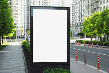 Blank advertising board on city street. Mockup for design