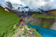 © robertharding - Woman trekking Humantay Lake, Cusco, Peru