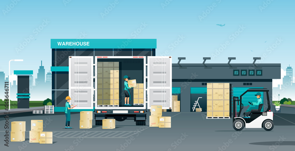 Workers loading goods onto trucks in a warehouse. - obrazy, fototapety, plakaty 