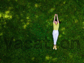 Wall Mural - vacation text on the ground woman lying down as I letter