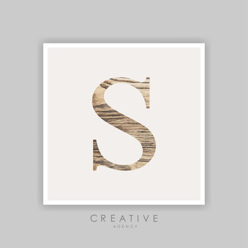 Vector font depressed retro alphabet. light wood texture.