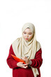 © Akmalism Photography - Woman muslim take note on note digital against a white background.
