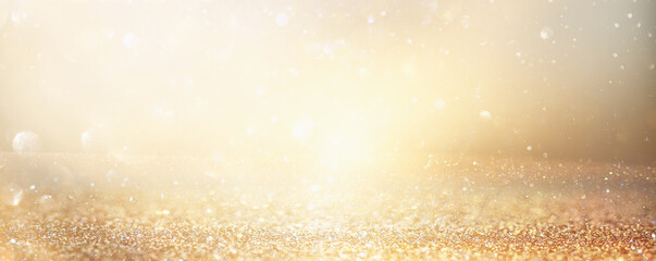 Wall Mural - background of abstract gold and silver glitter lights. defocused