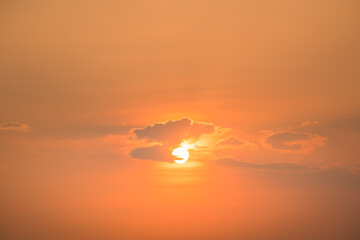 Sticker - Orange color sky with cloud and sun background