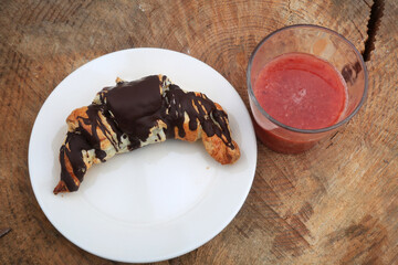 Poster - chocolate croissant and red orange juice