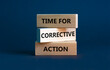 Time for corrective action symbol. Wooden blocks with words 'Time for corrective action' on a beautiful grey background. Business, time for corrective action concept. Copy space.