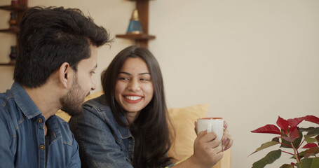 Closeup shot of a young Indian couple indoors