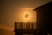 Moon Rising Above Beach House Porch.