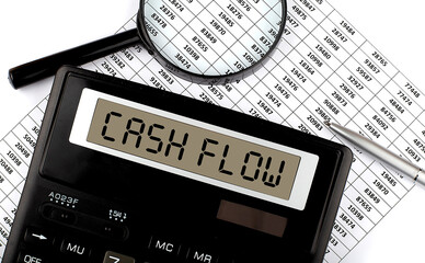 Poster - CASHFLOW word on calculator and pen on documents