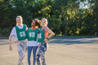 © Austockphoto - horizontal shot of three young women in sports wear posing for the camera on a sunny day