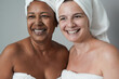 Multiracial women doing beauty day together - Mature people with different skin colors