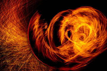 Circle of Fire flame with movment isolated on black isolated background - Beautiful yellow, orange and red and red blaze fire flame texture style.