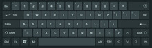 Keyboard With Black And Dark Gray Keys, And All Symbols, Letters Of The Alphabet And Numbers To Type -  International Design For A Vector Editable Keypad