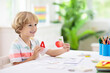 © famveldman - Kid learning to read. Phonics flash cards.