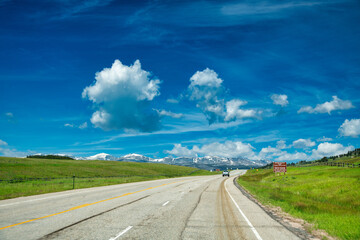 Sticker - Big Horn National Forest road in summer season, USA.