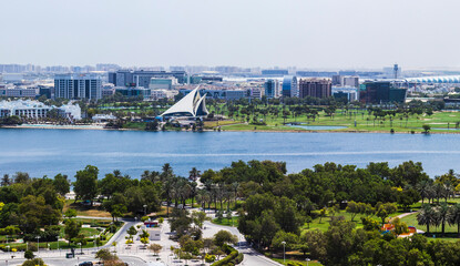 Wall Mural - Dubai,UAE - 07.22.2021 View of a creek park and children city. Also on shot airport terminal and creek yacht and golf club.City