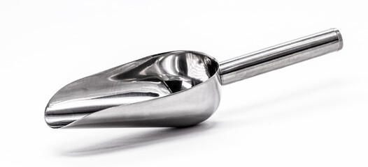 metal measuring spoon on isolated white background.