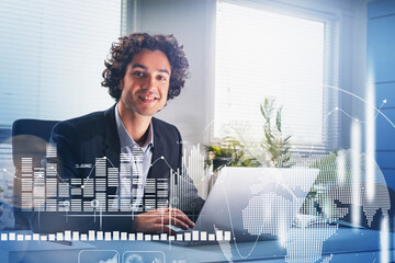 Aufkleber - smiling handsome hispanic businessman working on laptop to develop trading strategy. concept of anal